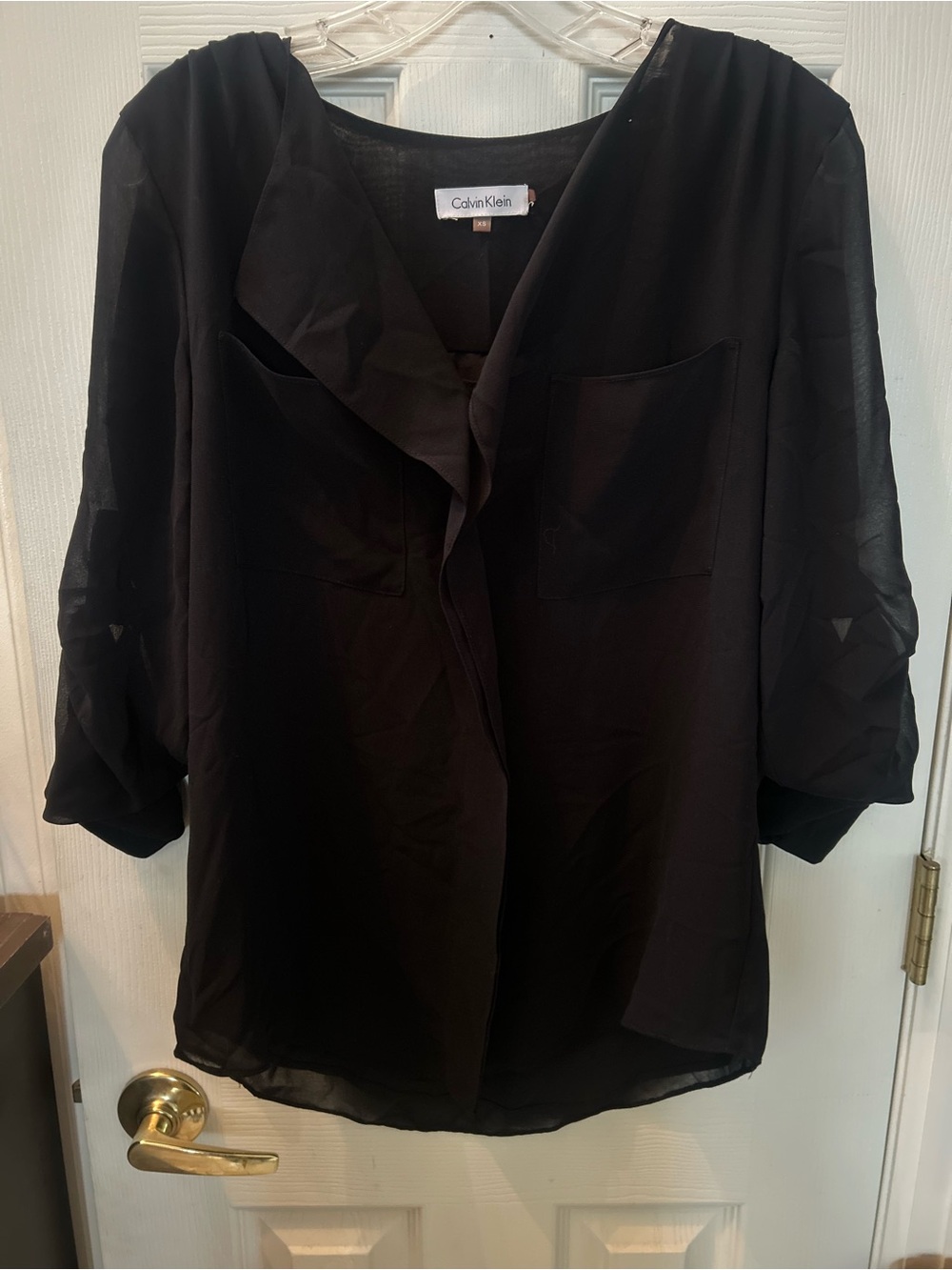 Calvin Klein Black Semi-Sheer w/ three quarter sleeves & buttons size XS.
